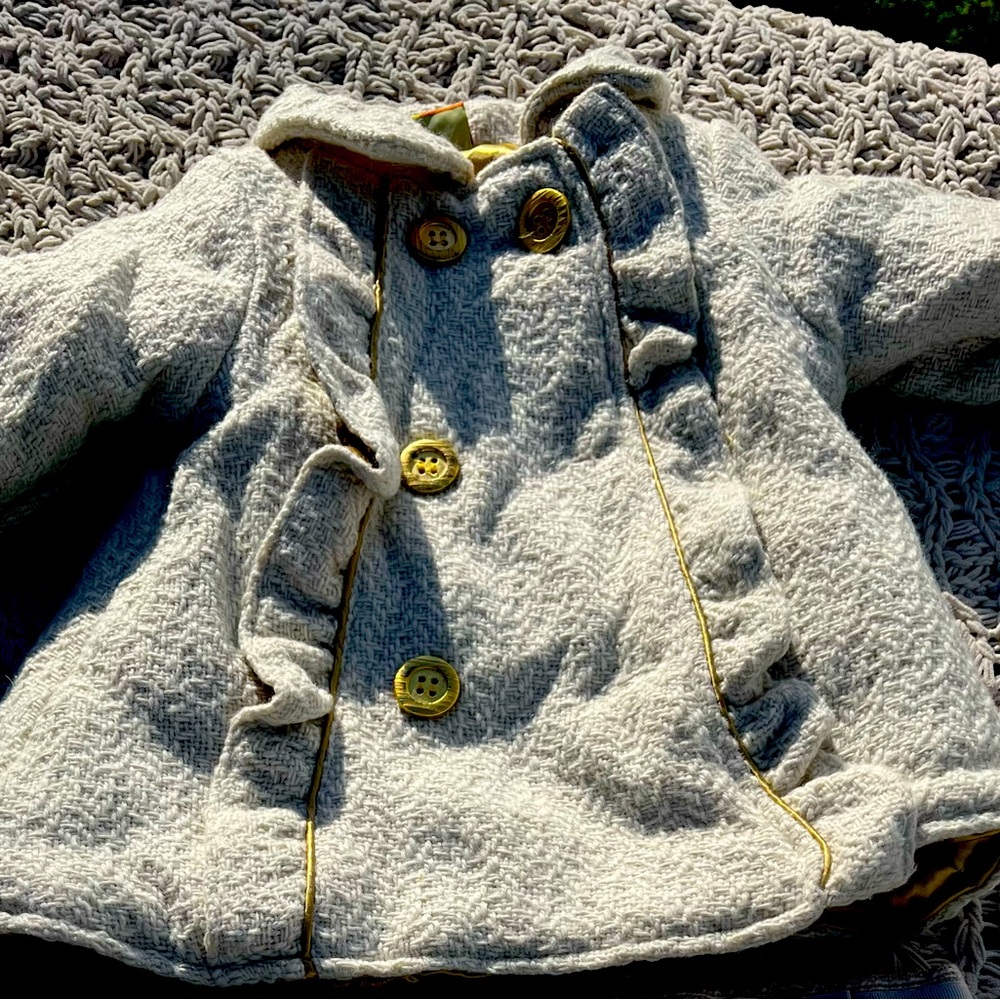 Cream knit peacoat with gold trim